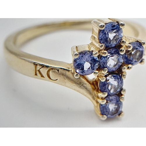 1961 - A Yellow Gold Gilt Sterling Silver Tanzanite Set Cross Ring Size M1/2. The Cross Measures 1.2cm Leng... 