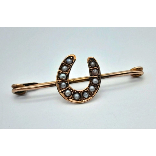 1968 - An Antique 9K Gold Safety Pin Bar Brooch with Seed Pearl Horseshoe Decoration. 3cm. 1.25g total weig... 