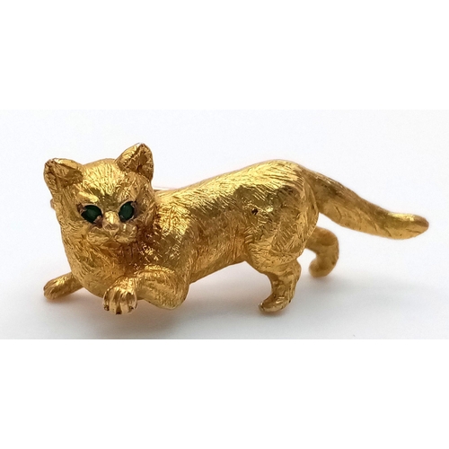 1684 - A 9K Yellow Gold Pussy Cat Brooch with Green Eyes. 2.5cm. 
8.35g weight.