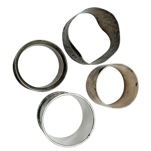 2204 - Four Different Style Vintage and Antique Sterling Silver Napkin Rings. 125g total weight.