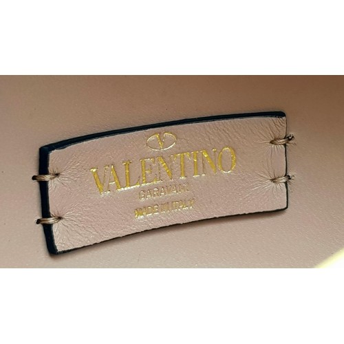 450 - Rare Valentino Gold Orb Clutch Bag. Metal exterior with a stone embellished V logo and clasp fasteni... 