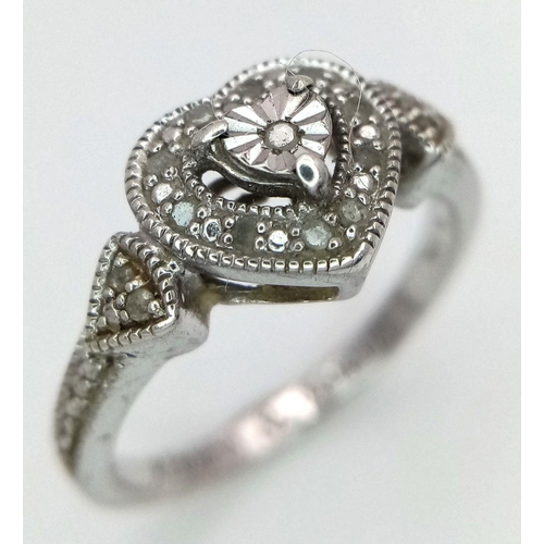 1701 - A fancy 925 silver Always & Forever stone set cluster ring with further decoration on shoulders. Tot... 