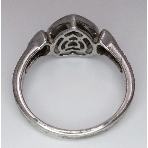 1701 - A fancy 925 silver Always & Forever stone set cluster ring with further decoration on shoulders. Tot... 