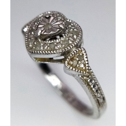 1701 - A fancy 925 silver Always & Forever stone set cluster ring with further decoration on shoulders. Tot... 