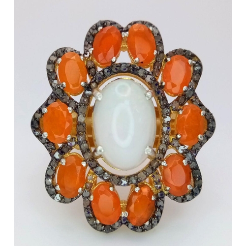 1938 - A 925 Silver White and Orange Opal Ring, featuring a central white opal surrounded by vibrant orange... 