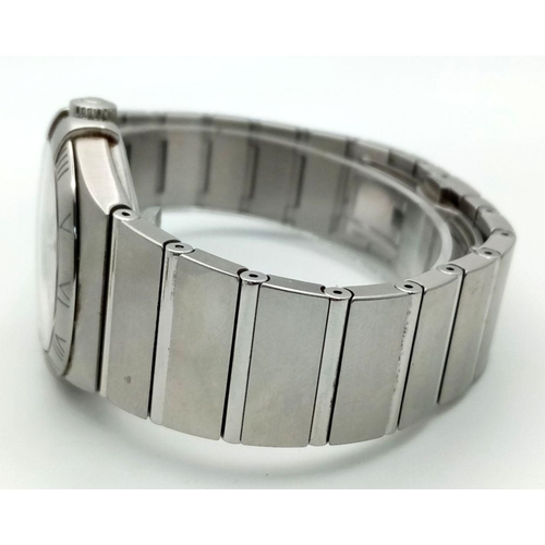 109 - An Omega Constellation Gents Watch. Stainless steel bracelet and case - 35mm. Quartz movement. Model... 