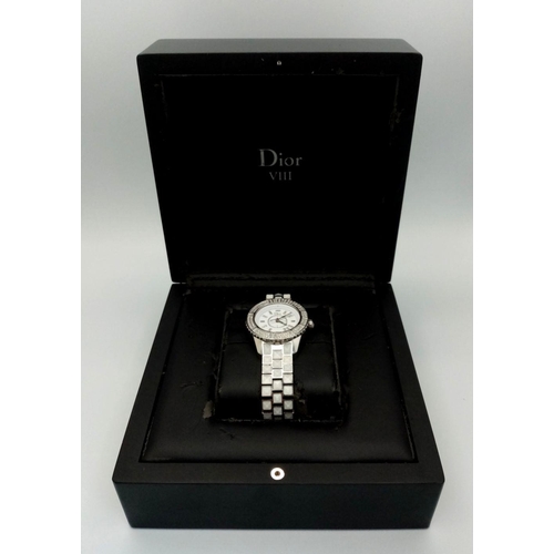 116 - A Christian Dior 'Christal' Diamond Quartz Ladies Watch. Stainless steel and white crystal bracelet.... 