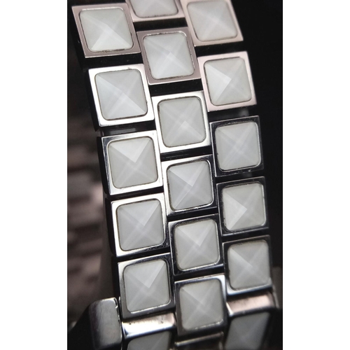 116 - A Christian Dior 'Christal' Diamond Quartz Ladies Watch. Stainless steel and white crystal bracelet.... 