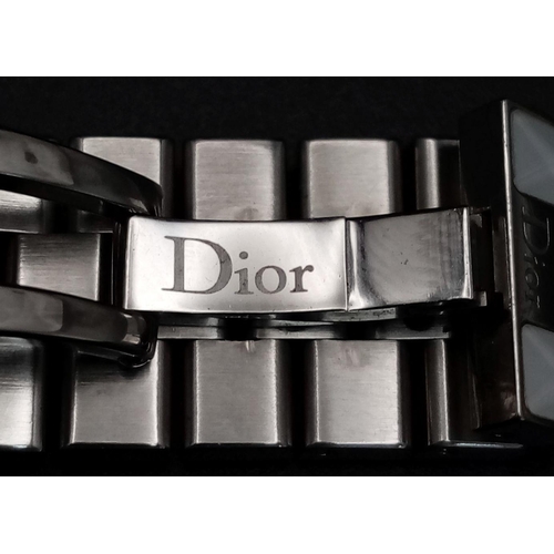 116 - A Christian Dior 'Christal' Diamond Quartz Ladies Watch. Stainless steel and white crystal bracelet.... 