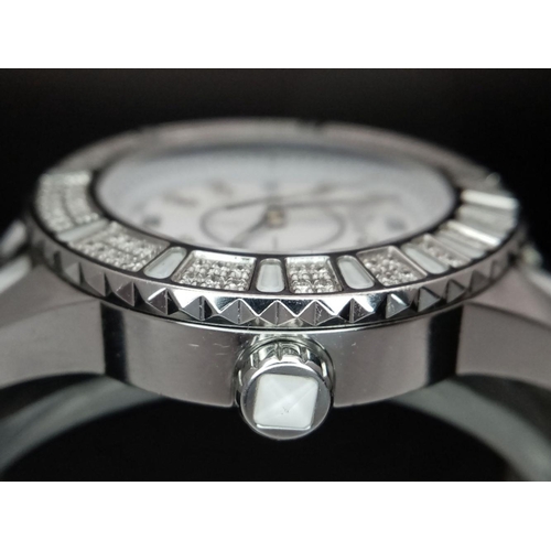 116 - A Christian Dior 'Christal' Diamond Quartz Ladies Watch. Stainless steel and white crystal bracelet.... 