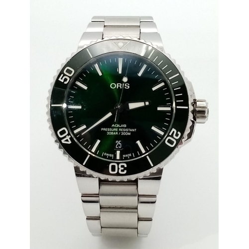 123 - An Oris Aquis Divers Automatic Watch. Stainless steel bracelet and case - 42mm. Vivid green dial wit... 