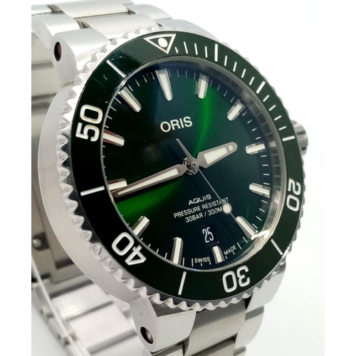 123 - An Oris Aquis Divers Automatic Watch. Stainless steel bracelet and case - 42mm. Vivid green dial wit... 