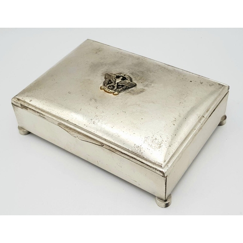 369 - A WW2 German Silver Plated Cigarette Box with a 1942 Police Badge.