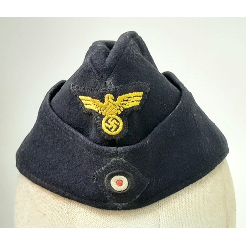 576 - A WW2 Kriegsmarine Enlisted Mans /Nco’s Side Cap. Overall very nice condition with no moth nips.