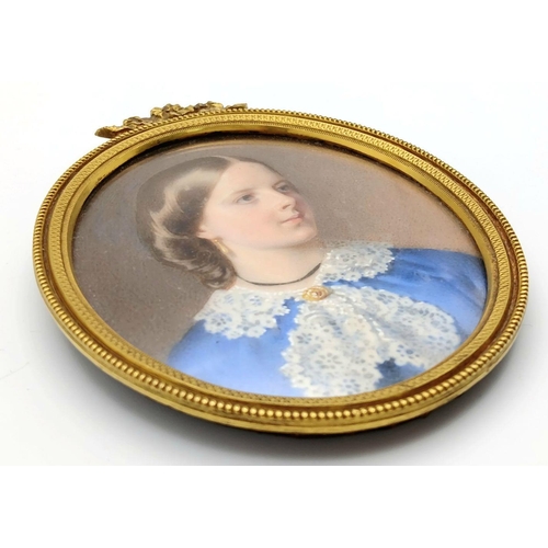 2077 - An Antique Victorian Miniature Hand-Painted Portrait of a Young Lady. Pinchbeck frame. 9cm x 7cm. Co... 