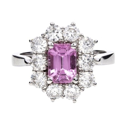 225 - An 18K Platinum Cluster Ring, featuring a 1.29ct Emerald-Cut Pink Sapphire surrounded by a halo of R... 