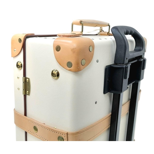 100 - A Globe-Trotter Beigh Plastic Suitcase. Plastic exterior with leather accents and gold-toned hardwar... 