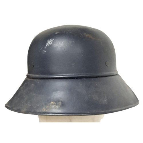 285 - A WW2 German “Gladiator” Civil Defence Helmet from the Heinkel Aircraft Works. Complete with liner &... 