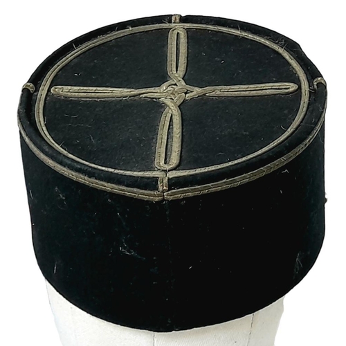 446 - A 1931 Model French Lieutenant’s Kepi Cap badged to the Alpine Infantry,