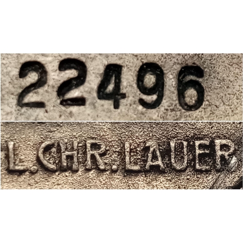 572 - A  Early 3rd Reich SA Silver Grade Sports Badge. Solid back type, Numbered. Maker: L.Chr. Lauer, Nur... 