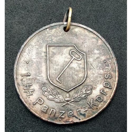 586 - A 3rd Reich 1st SS Panzer Corps Medallion.