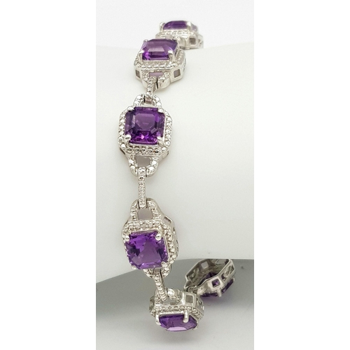 694 - A Sterling Silver Cushion Cut, Top Colour, Amethyst Tennis Bracelet. 21cm Length. Gross Weight 18.96... 