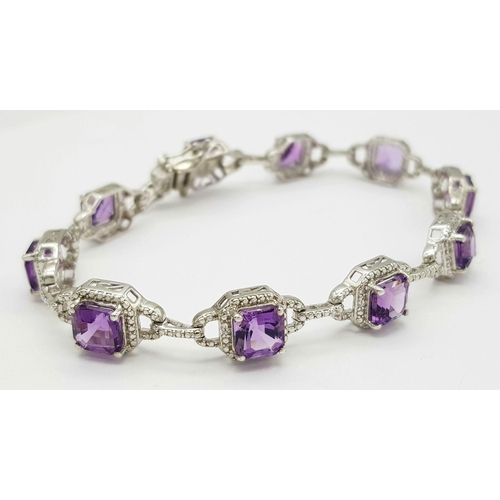 694 - A Sterling Silver Cushion Cut, Top Colour, Amethyst Tennis Bracelet. 21cm Length. Gross Weight 18.96... 