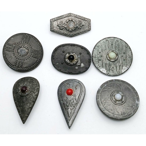 789 - A Set of Seven 3rd Reich Winterhilfswerk WHW Viking Shield donation badges.