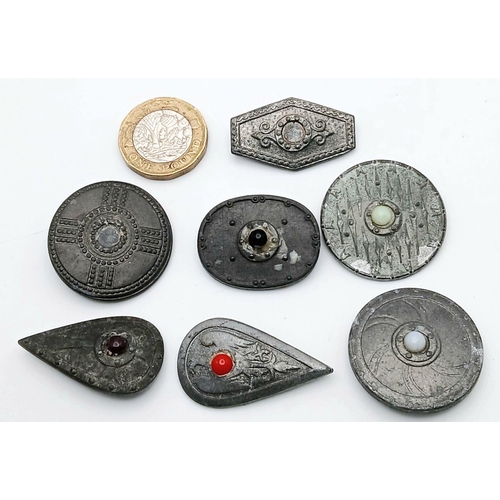 789 - A Set of Seven 3rd Reich Winterhilfswerk WHW Viking Shield donation badges.