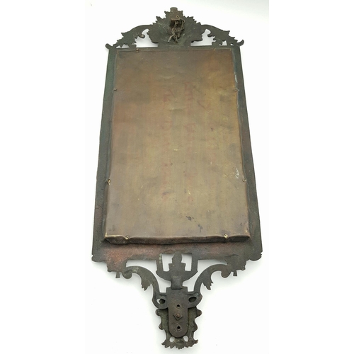 212 - A superb Antique Bronze Mirror of Quality - with a Bacchus type head at each end and original bevell... 