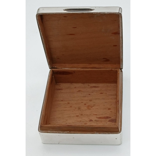 240 - A SUPERB SMALL ASPREY ENGINE TURNED SILVER BOX WITH CEDAR WOOD LINING.  182 GRAMMS.  DIAMETER 9CM.