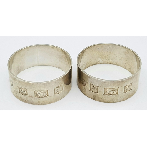 311 - A Pair of 925 Silver Napkin Rings by William Davenport. 62.24g total weight.