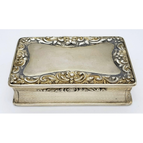 557 - A Silver Table Snuff Box by Edward Smith. Hallmarks for Birmingham, 1842. 9cm length x 5.8cm width x... 