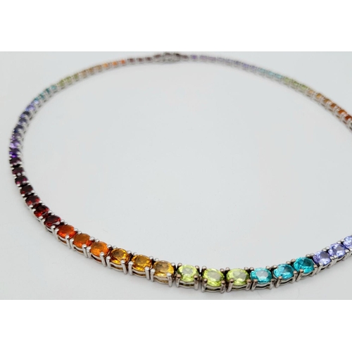 598 - A Stunning Sterling Silver Multi Gemstone Set Necklace-46cm Length. Set with Eight-Two 5mm Oval Cut ... 