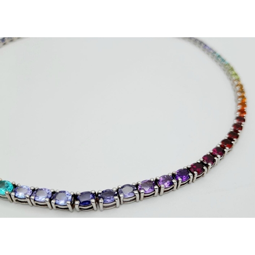 598 - A Stunning Sterling Silver Multi Gemstone Set Necklace-46cm Length. Set with Eight-Two 5mm Oval Cut ... 