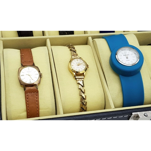 717 - A Ten watch Display Box with Ten  Dress and Fashion Watches Comprising; 1) A Unisex Timex Expedition... 