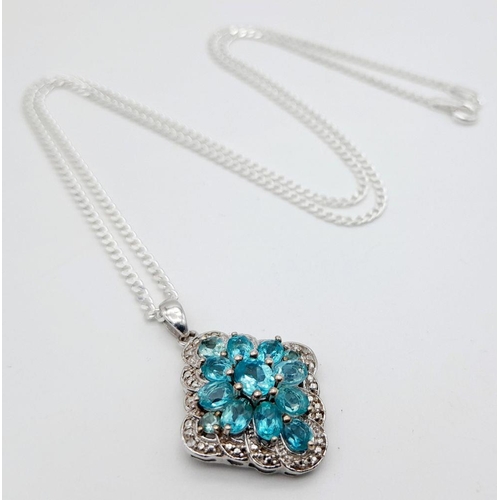 948 - A Blue and White Topaz Set Pendant Necklace. 46cm Length. Pendant Measures 1.8cm Width. Gross Weight... 