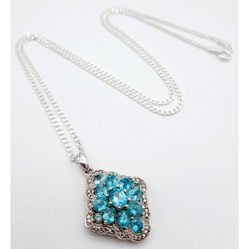 948 - A Blue and White Topaz Set Pendant Necklace. 46cm Length. Pendant Measures 1.8cm Width. Gross Weight... 