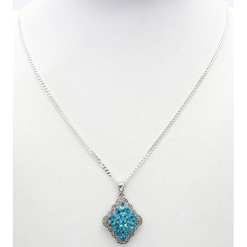 948 - A Blue and White Topaz Set Pendant Necklace. 46cm Length. Pendant Measures 1.8cm Width. Gross Weight... 