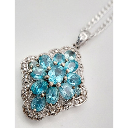 948 - A Blue and White Topaz Set Pendant Necklace. 46cm Length. Pendant Measures 1.8cm Width. Gross Weight... 