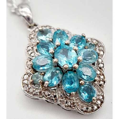 948 - A Blue and White Topaz Set Pendant Necklace. 46cm Length. Pendant Measures 1.8cm Width. Gross Weight... 