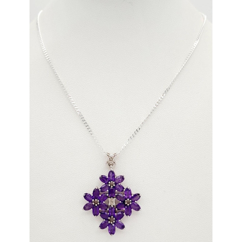 962 - A Sterling Silver Top Colour Amethyst Set Floral Cluster Pendant Necklace. 46cm Length. Pendant Meas... 