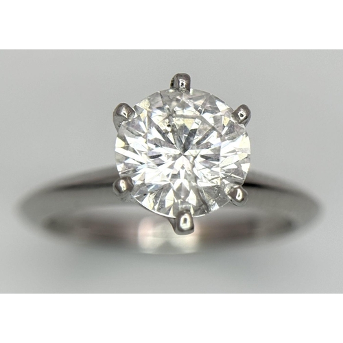 13 - A PLATINUM NATURAL DIAMOND SOLITAIRE RING. APPROX 2.10CT ROUND BRILIANT CUT. 6.4G, SIZE N. DIAMOND H... 