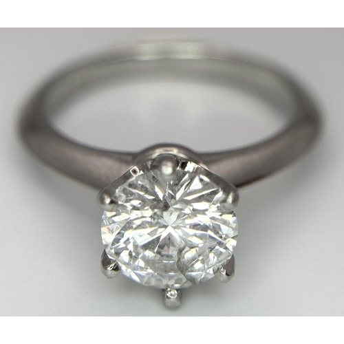 13 - A PLATINUM NATURAL DIAMOND SOLITAIRE RING. APPROX 2.10CT ROUND BRILIANT CUT. 6.4G, SIZE N. DIAMOND H... 