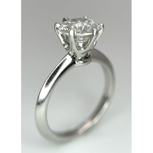 13 - A PLATINUM NATURAL DIAMOND SOLITAIRE RING. APPROX 2.10CT ROUND BRILIANT CUT. 6.4G, SIZE N. DIAMOND H... 