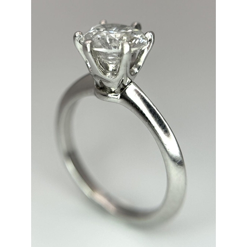 13 - A PLATINUM NATURAL DIAMOND SOLITAIRE RING. APPROX 2.10CT ROUND BRILIANT CUT. 6.4G, SIZE N. DIAMOND H... 