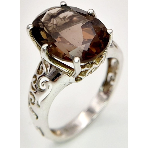 140 - Impressive 3 CARAT BROWN AMETHYST Oval Cut and mounted in a 925 SILVER RING. Having beautiful scroll... 