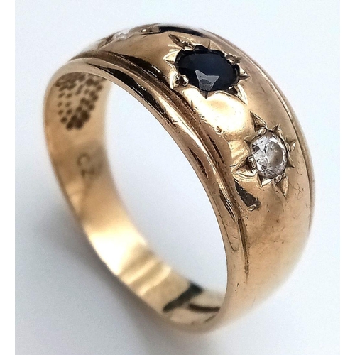 154 - A Beautiful TRADITIONAL 9 CARAT GOLD 3 STONE GYPSY RING. Having SPINEL Centre GEMSTONE with Round Cu... 