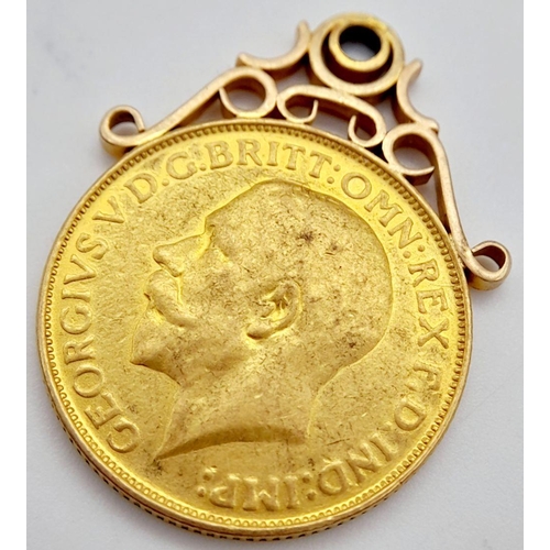 2 - A 22K GOLD FULL SOVEREIGN DATED 1911 WITH 9K GOLD SETTING , TOTAL WEIGHT 9.1gms