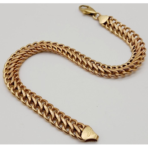 22 - A 9K GOLD CUBAN LINK BRACELET .   5gms   18.5cms